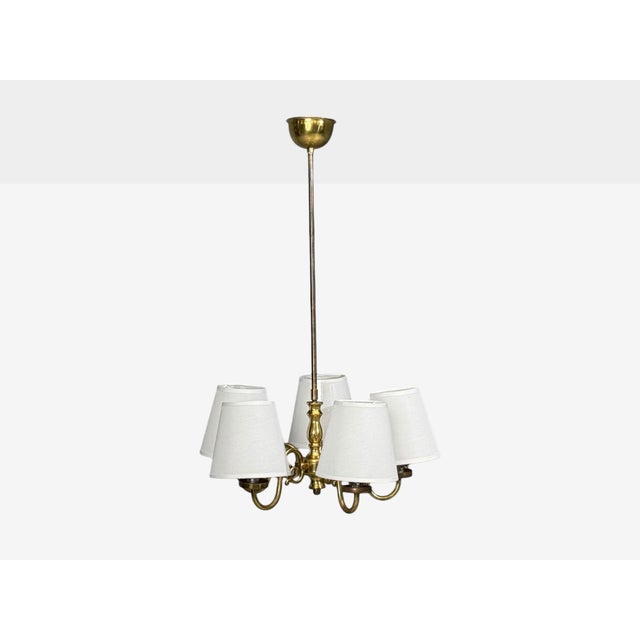 Swedish Mid-Century Modern, Pendant Light or Chandelier, Brass, Fabric, Sweden, 1950s An interesting five (5) light...