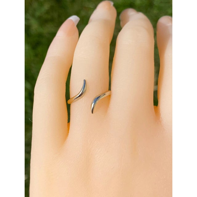 The Solana Beach Simple Bypass Ring in White Gold. Crafted in 14 karat white gold, this ladies bypass style ring is the...