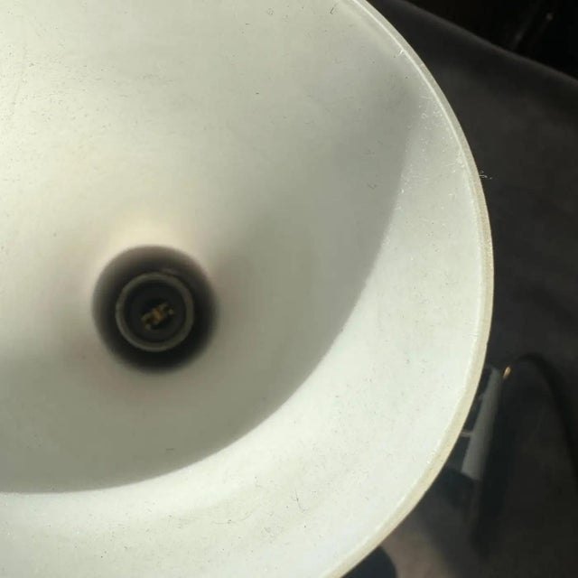 This is an exquisite pair of Italian Mid-Century Modern wall sconces from the 1950s, embodying the sophisticated design...