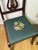 Set of four vintage, drop-in seat side chairs featuring graceful lyre-form splats, shaped crest rails, and tapered legs....