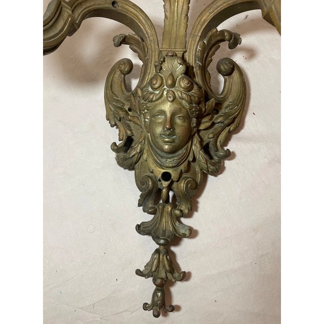 Add a touch of elegance to your home with this LARGE ornate Victorian gilt bronze wall sconce. The intricate design and...