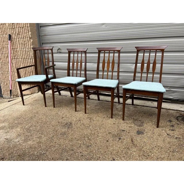 Set of Four Mid Century Walnut High Back Dining Chairs. Circa 1960s. Solid wood, sturdy . 3 side chairs and 1 armchair....