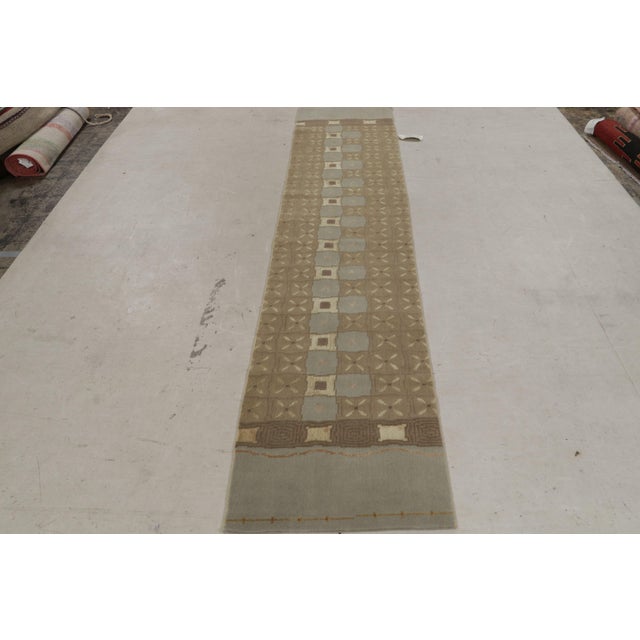 Hand knotted in Nepal featuring durable wool and silk body, this contemporary Orendi rug marries many inviting geometric...