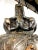 Cast bronze with a dark patination, the neoclassical greek style urns with of typical form with handles and relief in the...