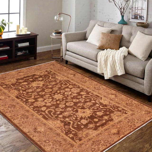 "Enhance the ambiance of your home with this magnificent Persian-influenced Turkish hand-knotted rug made by skilled...