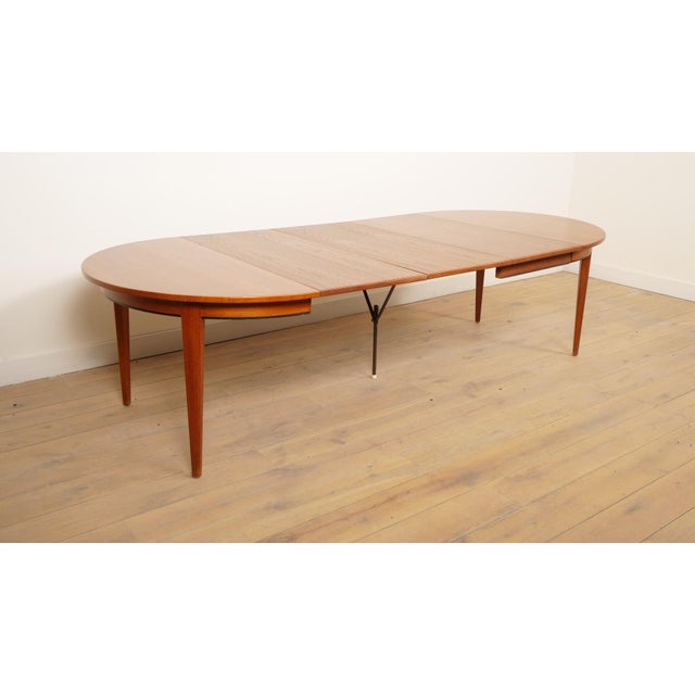 Designed by Omann Jun (model 55), this multifunctional dining table is incredibly handy. You transform the compact round...