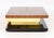 Brabbu "Lallan" Coffee Table, with walnut top above gilt brass undertier above black lacquered base. 14.75" H x 47.25" W x...