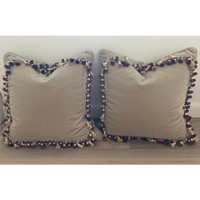 Beautiful Pair of Beige Mohair Pillows with Lee Jofa Designer Trim Applied to the Front. The pillows are stuffed with down...