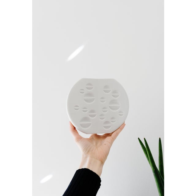 Scarce modernist matte white porcelain vase created by West German porcelain maker Thomas in the 1950s. Very rare raised...