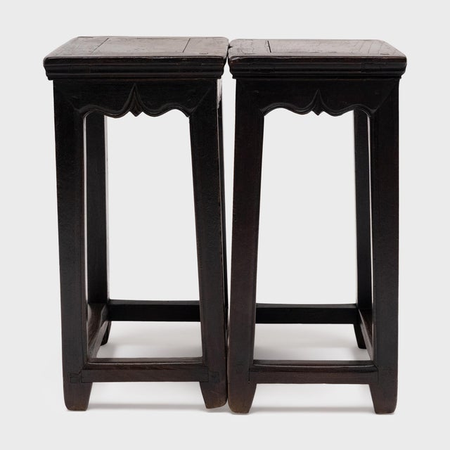 This pair of antique Chinese end tables marries simplicity of form with a touch of traditional craftsmanship. Known as...