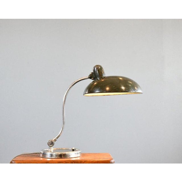 Model 6630 Table Lamp By Kaiser Idell Circa 1930s Chrome S shaped arm - Steel shade with Kaiser Idell relief branding -...