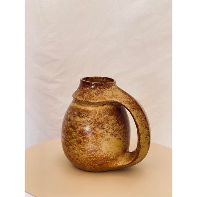 Wonderful Italian ceramic design by Roberto Rigon for Bertoncello. The organic shape is complemented by a the equally...