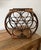 A beautify boho piece from the 1970s. Bent bamboo frame in a coffee stain with room for 7 bottles.