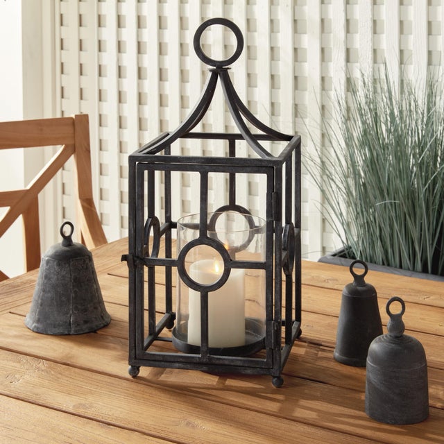 Although it has a traditional silhouette, this outdoor candleholder has a contemporary feel. With a look reminiscent of an...