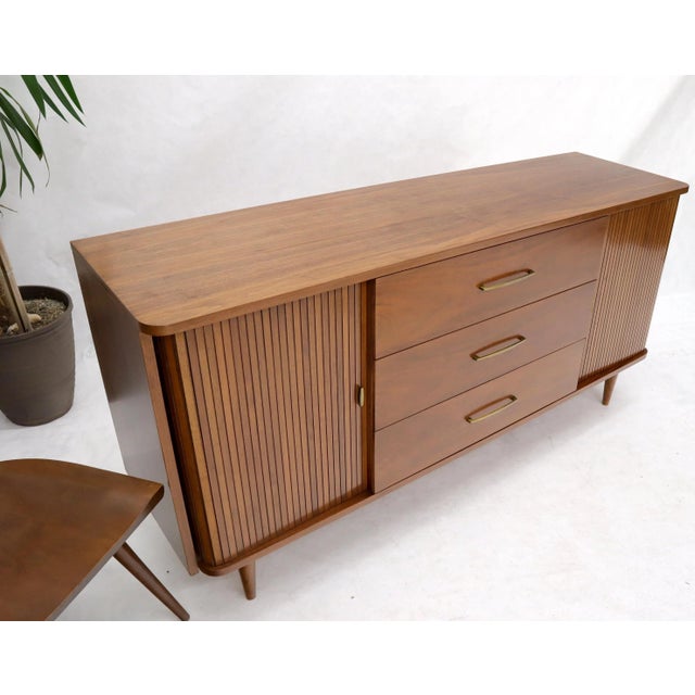 Medium light walnut tambour doors long dresser credenza.