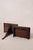 Pair of English mahogany wall brackets with carved shelves, shaped supports, and rich wood grain.