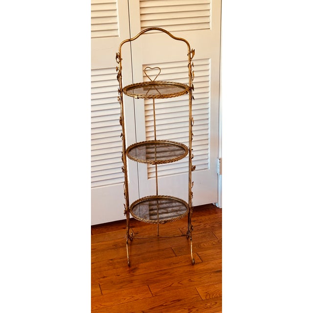 Vintage Mid-Century Italian Florentine Tole Gold Gilt Étagère or Three-Tiered Foldable Serving Tray Table Gilt metal and...