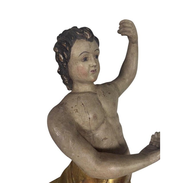 19th century Italian carved statue of polychromed and giltwood figure on Lucite base.