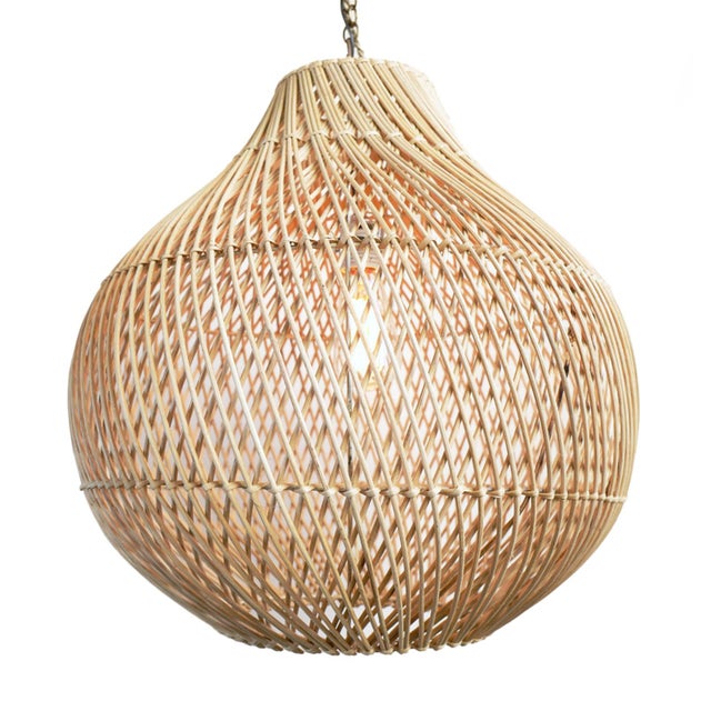 Natural hand woven wicker Bawang style hanging lantern. Beautiful warm glow when illuminated. Each may vary in natural...