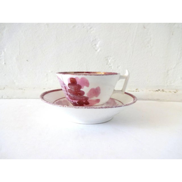 An antique, Georgian, early 1800s bone china lusterware / lustreware / rose luster / pink luster teacup and saucer, with...