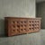 Rhythmic geometry meets raw materiality in this commanding 1960s Spanish brutalist case piece. Deeply faceted pyramid...