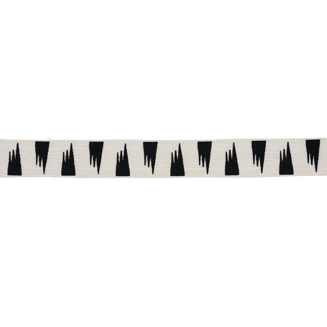 Embroidered African motifs burst across Tutsi Trim, designed by David Kaihoi. The linen ground is printed with subtle...