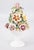 A beautiful vintage ceramic Italian topiary centerpiece, adorned with lovely pastel roses in a white fluted pedestal. Made...