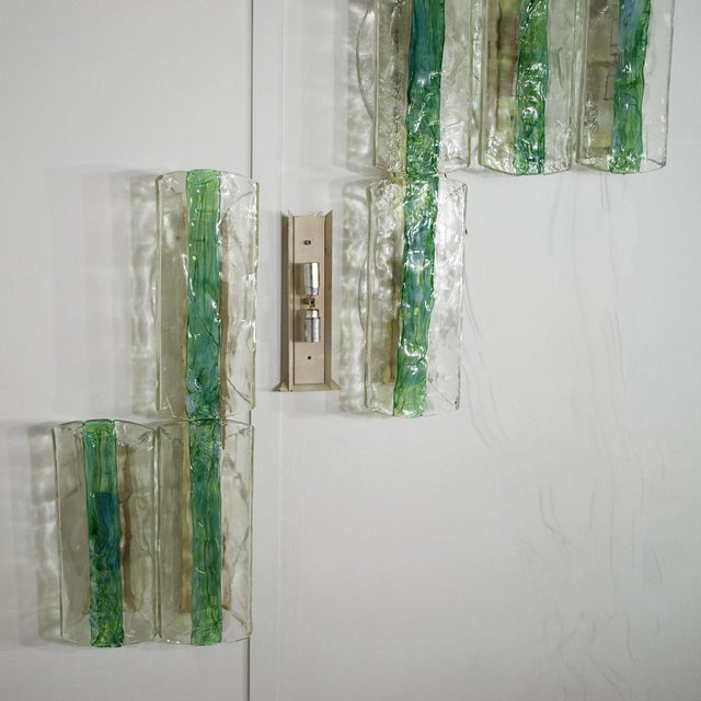 The set consists of 13 coloured wall lights, 2 of which are spun, and 2 completely transparent. I have official proof of...