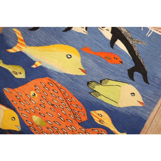 3rd quarter of the 20th Century western European Kilim featuring a flurry of fishes rug no. j3621 size 2' 10" x 3' 8" (86...
