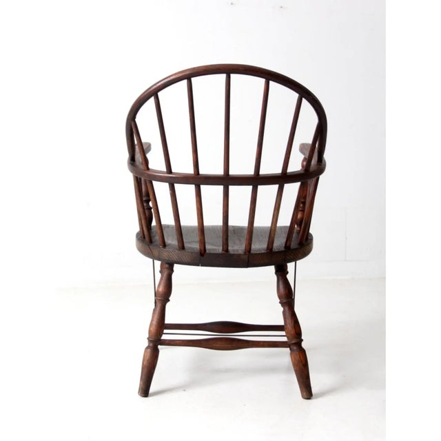 This beautiful 19th-century Windsor armchair blends historical charm with enduring style. The classic form features a...