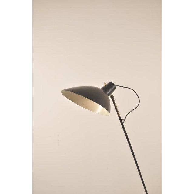Floor lamp by Vittoriano Viganò for Arteluce, circa 1951, model 1047 with adjustable black lacquered aluminum shade, brass...