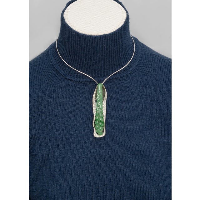 Large 18K white gold diamond carved jade pendant also can wear as a brooch set with 84 round brilliant cut diamonds...