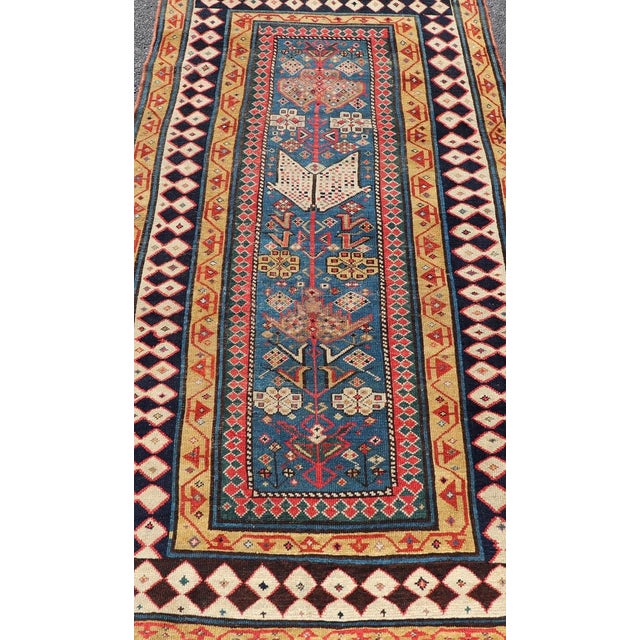 Antique Caucasian Shirvan Rug with Tribal Design and Motifs in Vivid Colors. Keivan Woven Arts / rug X23-0810-55, country...