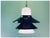 Elegant Scandinavian pendant lamp produced in Denmark during the 1970s. The lamp combines black lacquered metal shades...