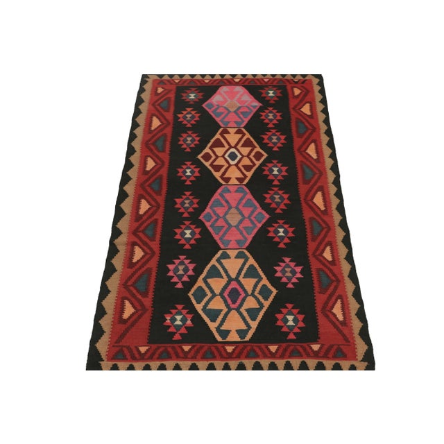 This vintage 5x10 Persian Kilim is a tribal rug from Meshkin—a small northwestern village known for its fabulous works....