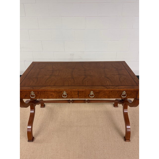 Having just completed a total restoration by Master craftsmen, this gorgeous Burled Elm Writing desk from Baker is the...