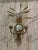 This decorative Italian sconce set dates to the mid-century period and is fashioned from gold-toned metal. Each fixture...