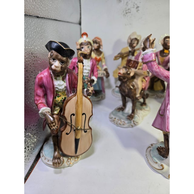 Britians National Trust Chelsea House Porcelain Monkey Band sold as found without damage.