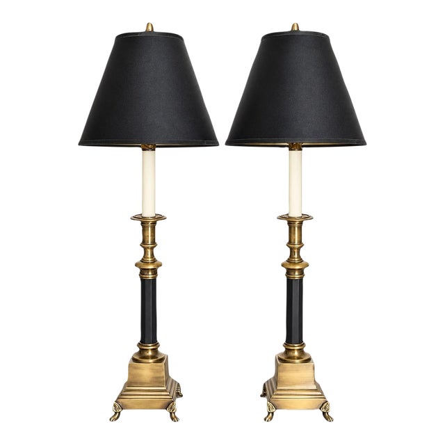 Late 20th Century Classic Aged Brass and Black Candlestick Lamps With Paw Feet and Black Parchment Shades - Pair For Sale