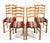 A delightful set of 4 Danish midcentury modern ladder back type dining chairs. The chairs are constructed of oak and are...