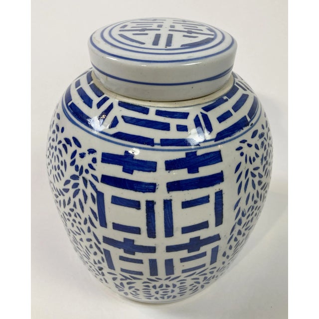 Vintage bright blue and white Chinese hand-painted ceramic double happiness ginger jar with lid. Unique markings. Minor...