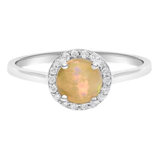 10K White Gold Opal and 1/10 Cttw Diamond Halo Ring For Sale