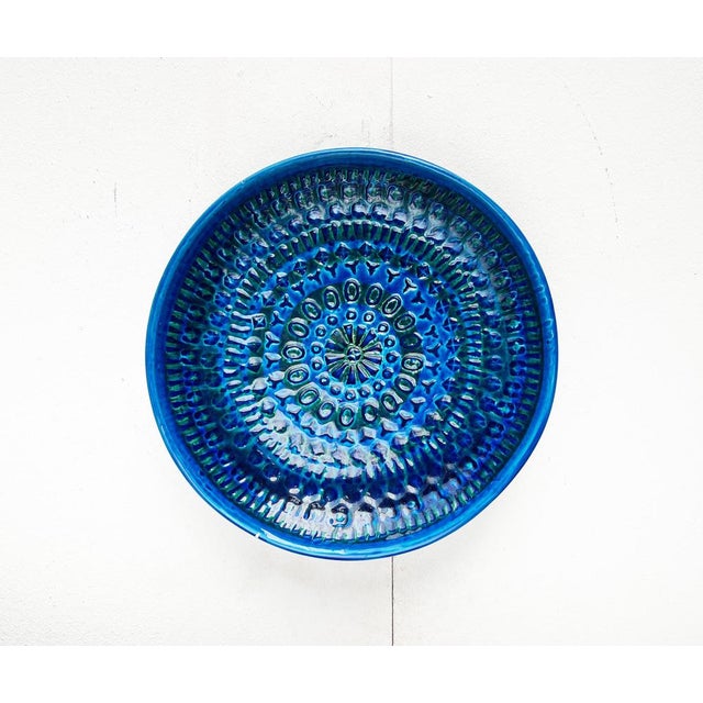 Large Rimini Blue as decorative Wall Plate or Bowl. Very Rare in this size with a diameter of 31.5 cm. This piece has an...