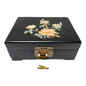 Large Mid-Century Black Lacquer Wooden Musical Jewelry Box With Carved Stone Floral Motif