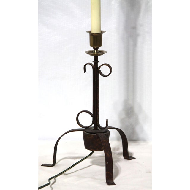 A beautiful, hand-wrought iron candlestick lamp with scrollwork! This gorgeous piece is by the JG Rempp Company, from the...
