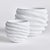 A graphic pattern of concentric circles make this set of pots very mod indeed. A thick white glaze adds a fresh, light...