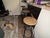 These are Farmhouse Wood + Iron Round Adjustable Stools by Design Mix Furniture