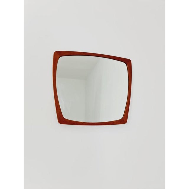 Big Danish teak mid-century Modern wall-mounted mirror, 1960s Made in Denmark Height: 57centimeters Width: 56 centimeters...