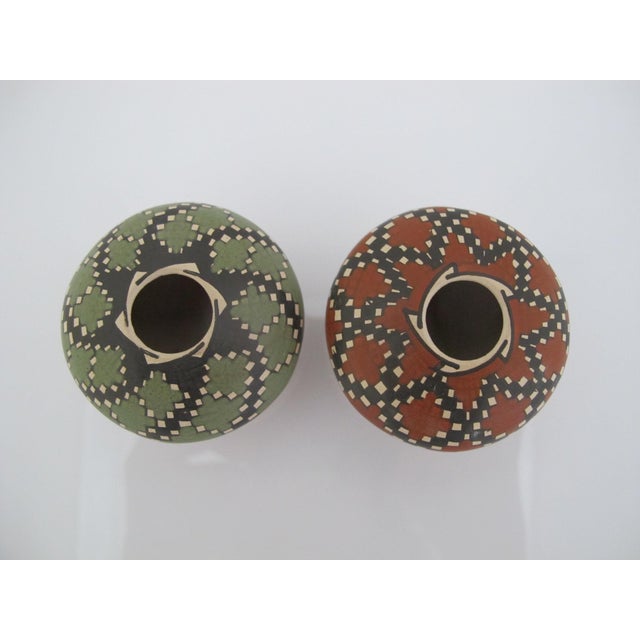 Miniature Mata Ortiz hand-coiled seed pots, created by renowned artisan Chelo Acosta. Hand-painted with fine geometric...