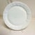 Offering a round Grapes and Leaves Milk Glass Platter from Colony Brand of Indiana Glass Company. The platter has a...
